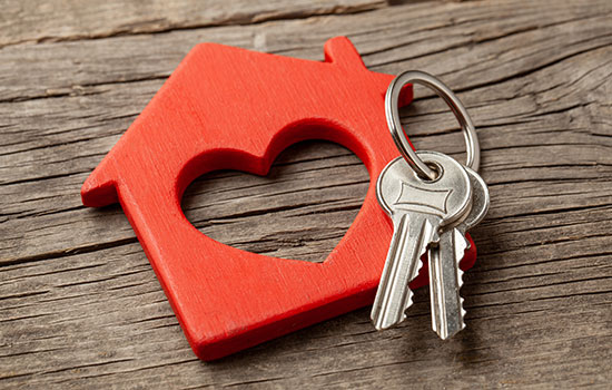 miniature red house with keys